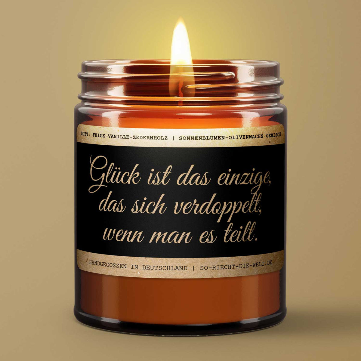 Motivations-Botschaft Kerze "Glück ist das einzige, das sich verdoppelt, wenn man es teilt." Duft: Feige-Vanille-Zedernholz